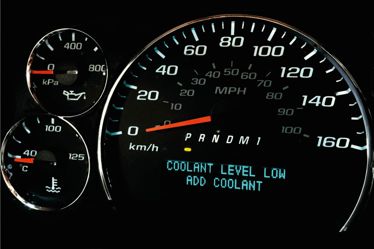Coolant level low warning light on dashboard