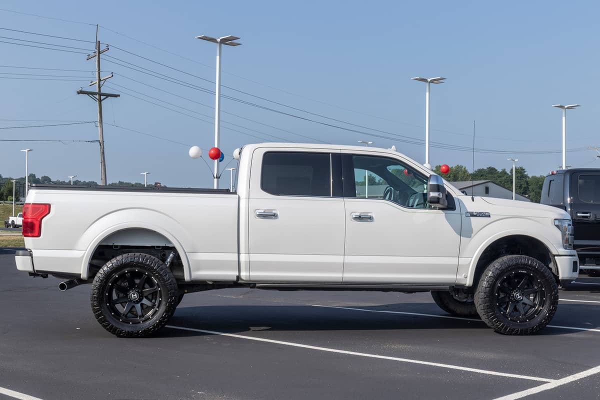  Ford F-150 display at a dealership. The Ford F150 is available in XL, XLT, Lariat, King Ranch, Platinum, and Limited models.