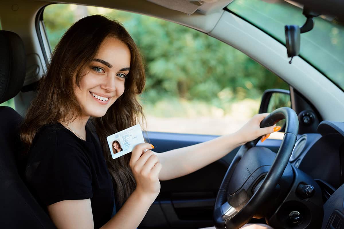 Girl shows drivers license
