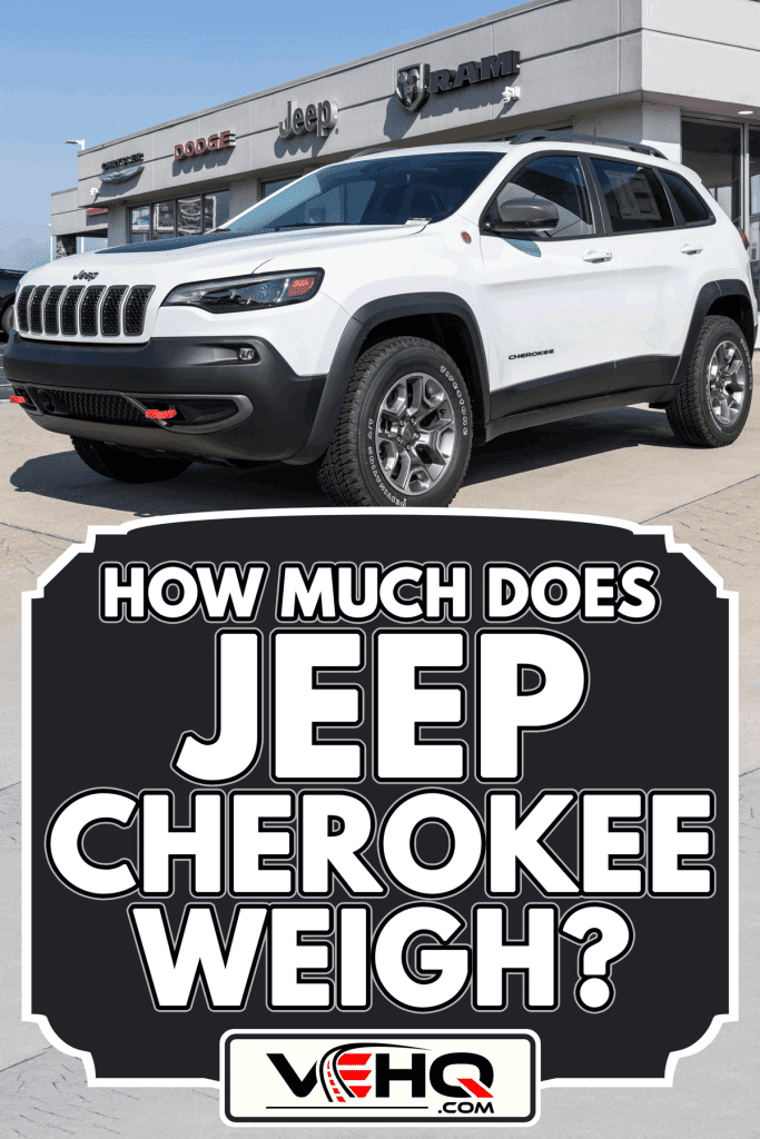 Jeep Cherokee SUV display at a Chrysler dealership, How Much Does Jeep Cherokee Weigh?