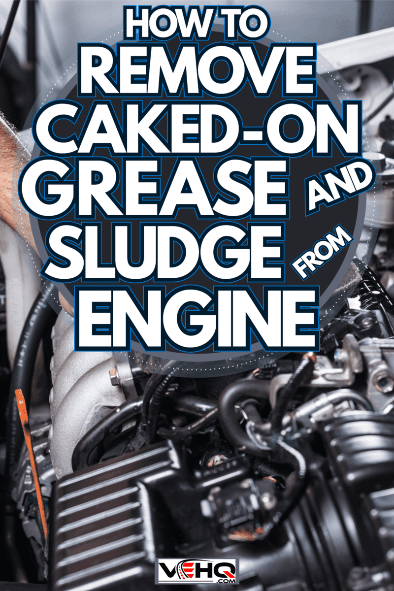 Mechanic cleaning the engine with a cloth, How To Remove Caked-On Grease And Sludge From Engine