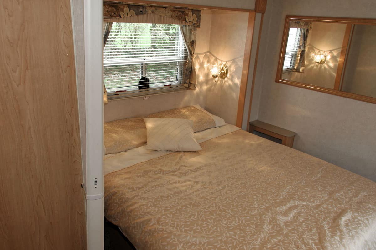 Interior of a large ARV or recreational vehicle showing its bedroom