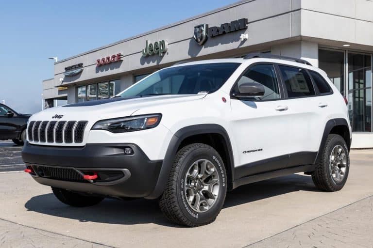 A jeep Cherokee SUV display at a Chrysler dealership, How Much Does Jeep Cherokee Weigh?