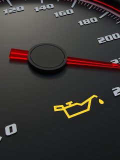 An oil light on car dashboard, Can You Drive With The Oil Light On [And How Far]?