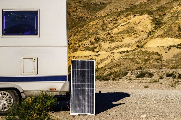 Portable solar photovoltaic panel, charging battery at camper car rv, Trailer Battery Not Charging—What To Do?