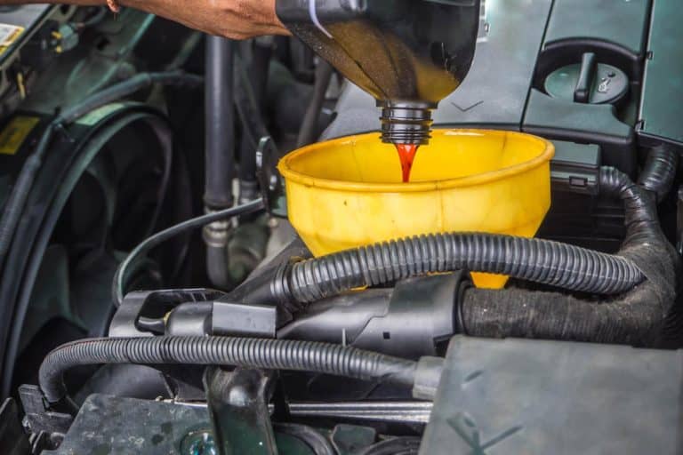 Pouring a transmission oil on car engine, How To Keep Transmission Cool When Towing