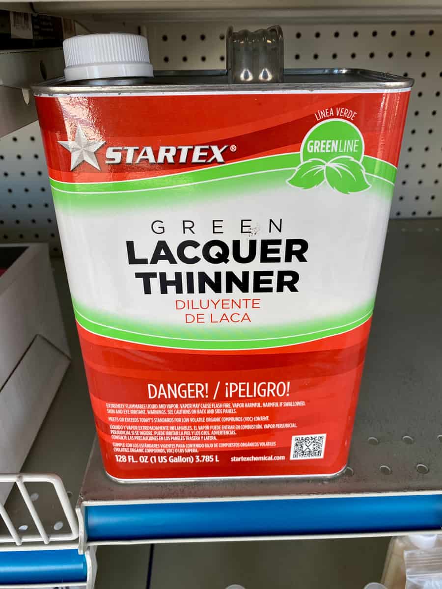 Startex brand of Green Lacquer Thinner in metal container at a paint store.