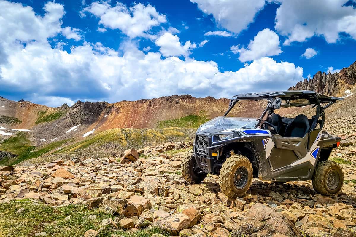 4x4 Side-by-Side off-road vehicle, UTV ATV with a beautiful mountain range
