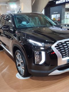 A new Hyundai Palisade car is exhibited in a shopping center mall, What Are The Hyundai Palisade Trim Levels?