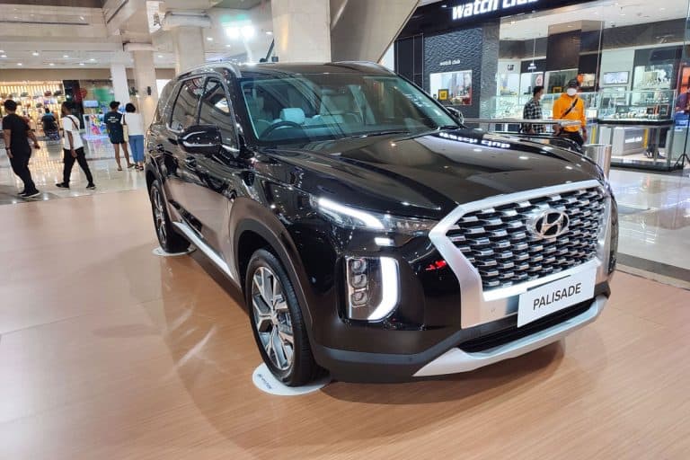 A new Hyundai Palisade car is exhibited in a shopping center mall, What Are The Hyundai Palisade Trim Levels?