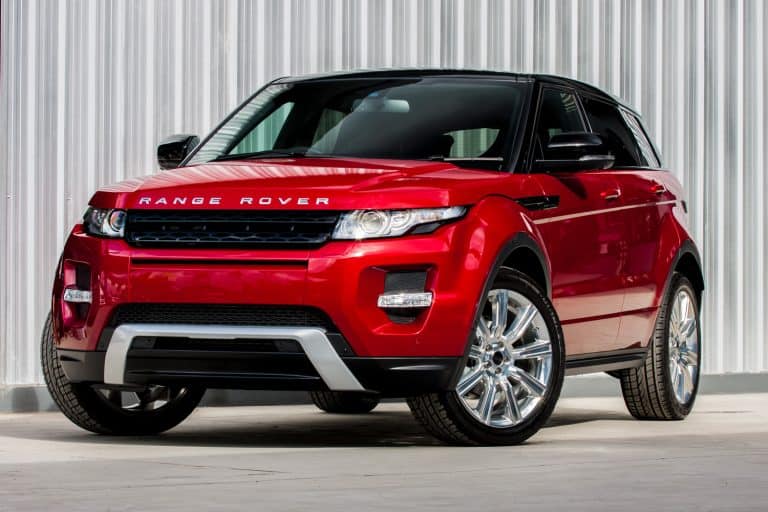 A photo of a parked red range rover evoque 2012 on display outside of a car dealership - Range Rover Door Not Closing—What To Do