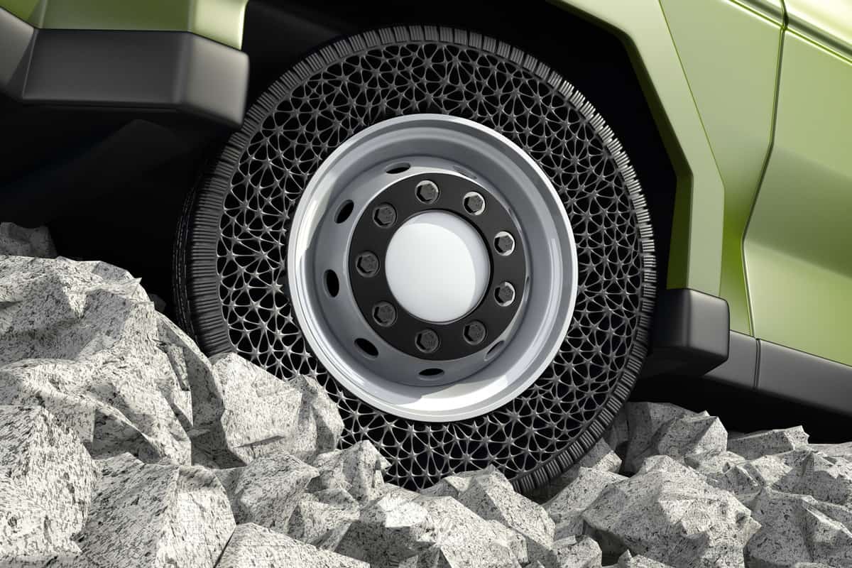 Airless tire on army vehicle on off road.