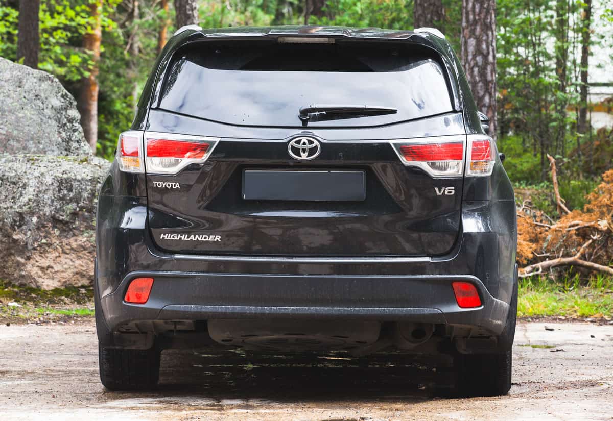 Black Toyota Highlander car, rear view