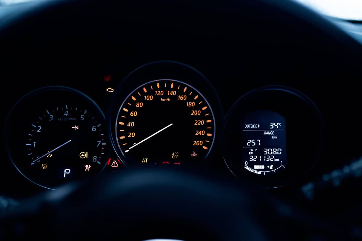 Car dashboard interior view. Car instrument panel with tachometer and speedometer. Data information dashboard show gas tank and full battery level icon. rpm gauge and speed meter. Hybrid car dashboard