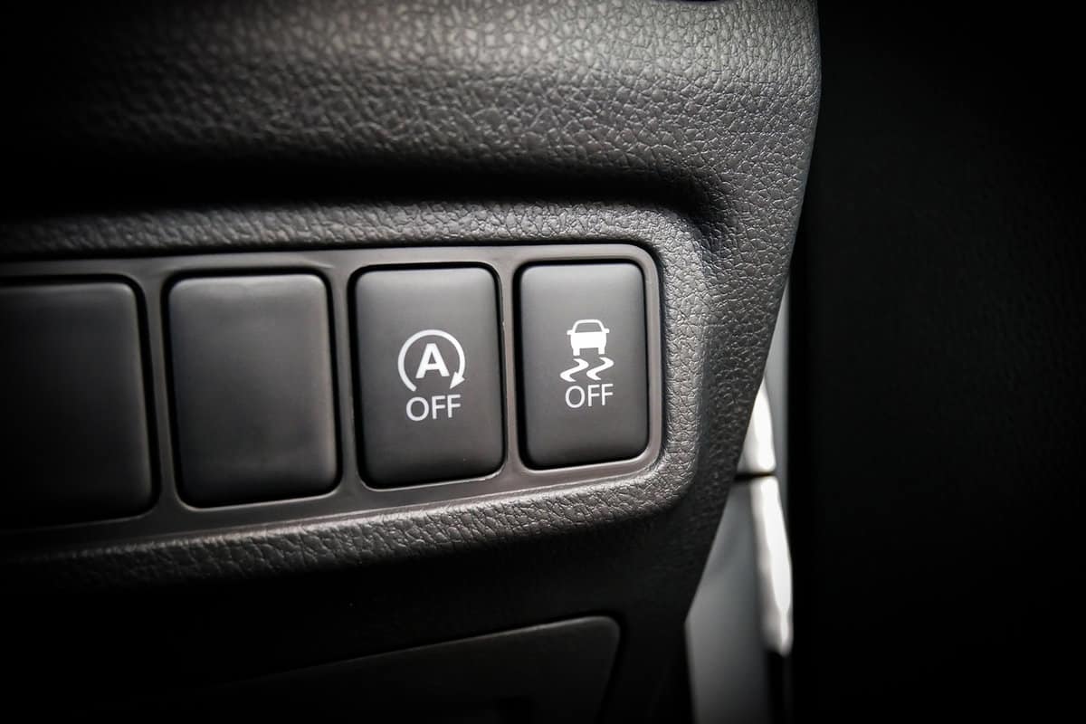 Car Auto Start and Stop Button and Traction Control Button in a Car