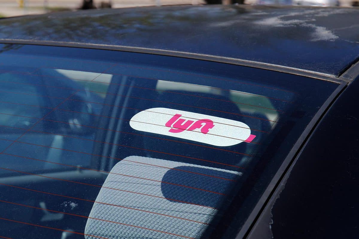 Car for hire with a Lyft sticker
