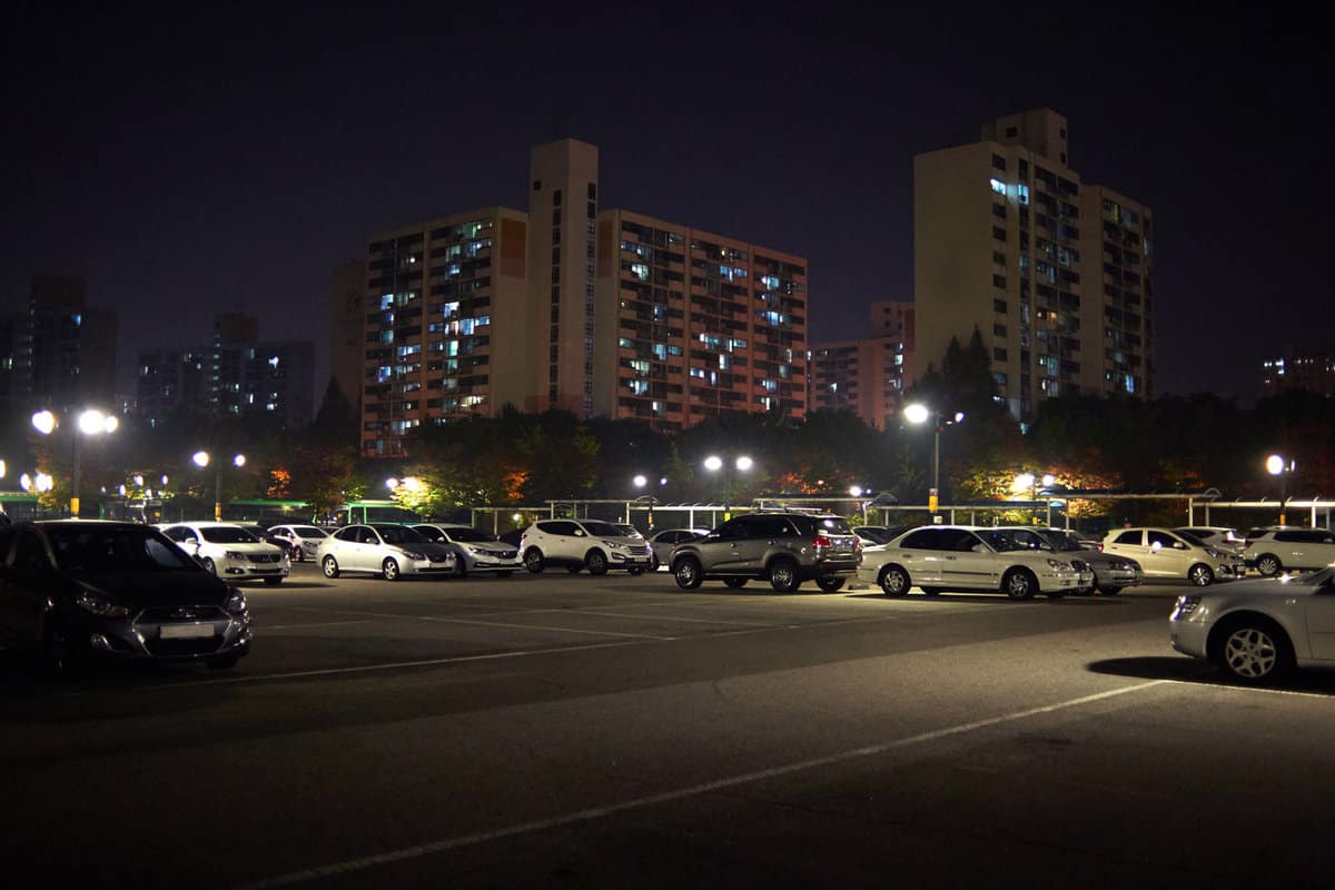 Cars at a parking lot photographed in midnight