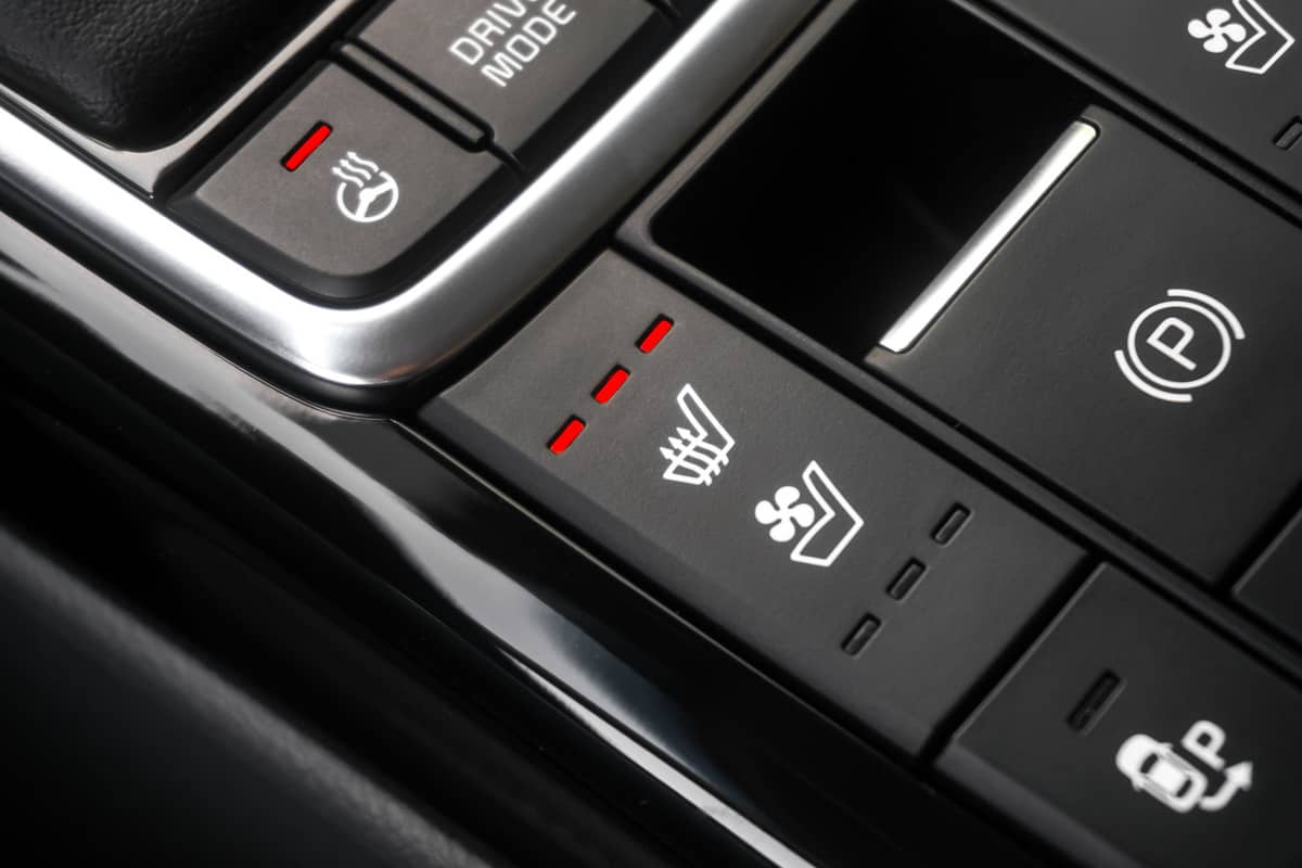 Close up shot of modern car central console with seat and steering heating controls