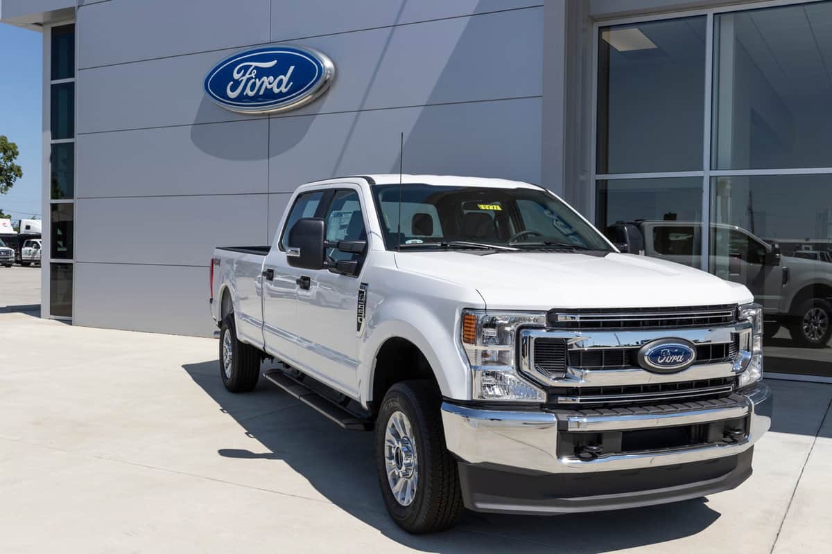 Ford F-250 display at a dealership. The Ford F250 is available in XL, XLT, Lariat, King Ranch, and Platinum models.