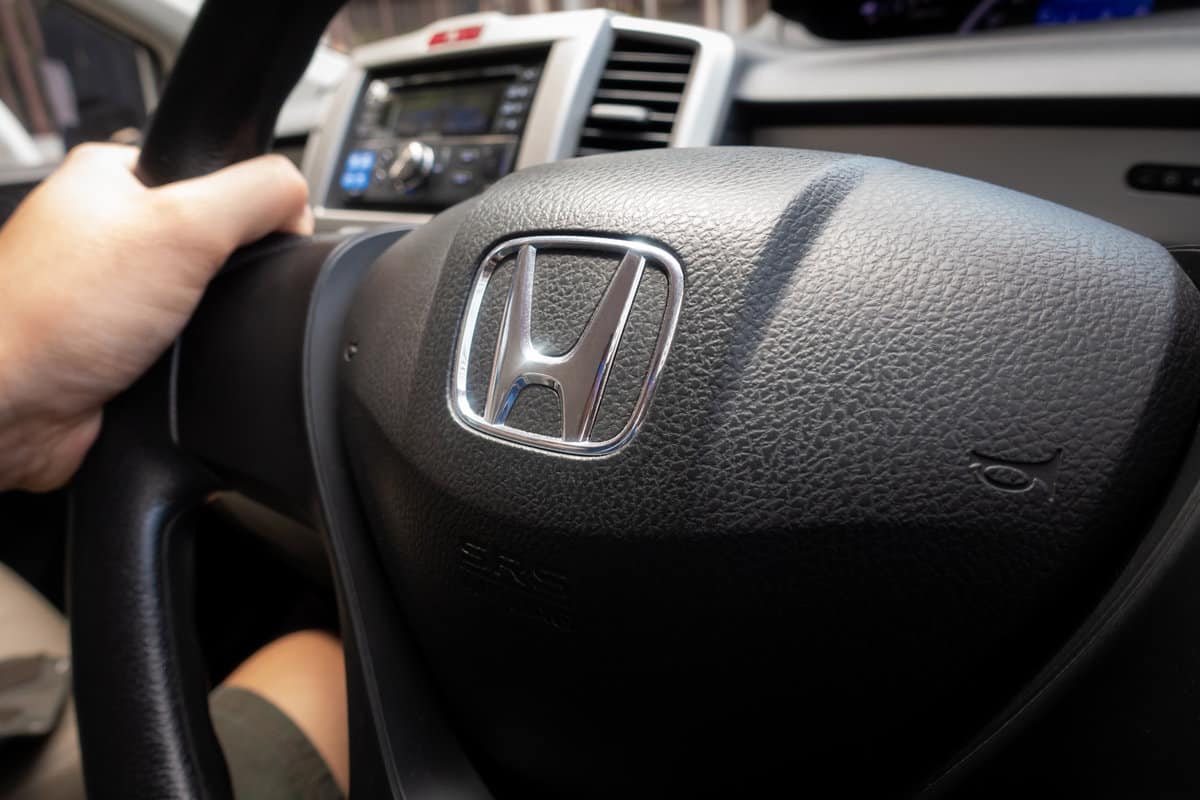 Honda Freed Black Steering Wheel with Honda logo.