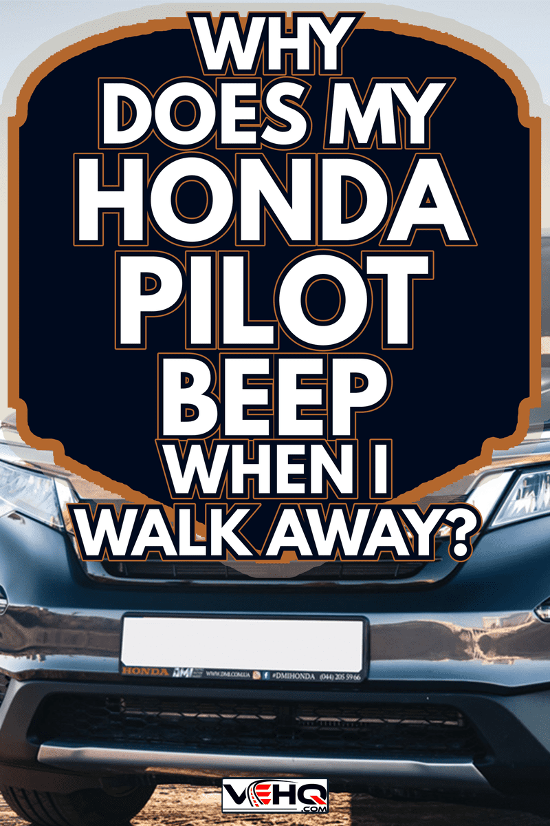 Honda Pilot Touring 2019 in a gary color near the river on a sunny day - Why Does My Honda Pilot Beep When I Walk Away