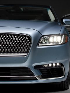 A Lincoln Continental 80th anniversary coach door edition SUV is parked in showroom, How To Program Garage Door Opener In A Lincoln Car