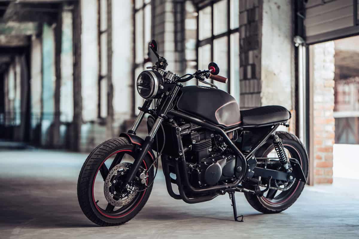 Modern black motorcycle in garage