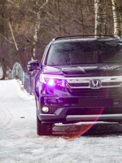 New Honda SUV Pilot 3 Generation Black in winter off-road, How Does A Honda Pilot Drive In Snow?