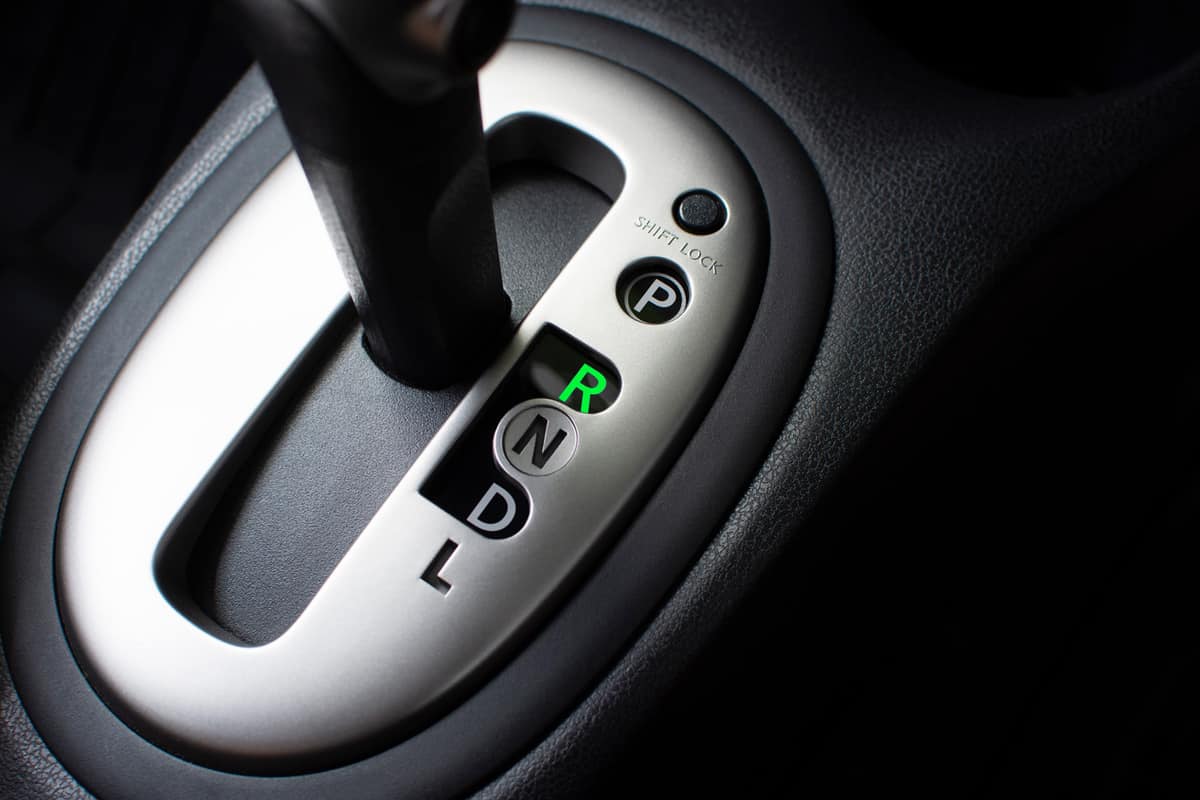 Put a gear stick into R position, (Reverse) Symbol in auto transmission car.