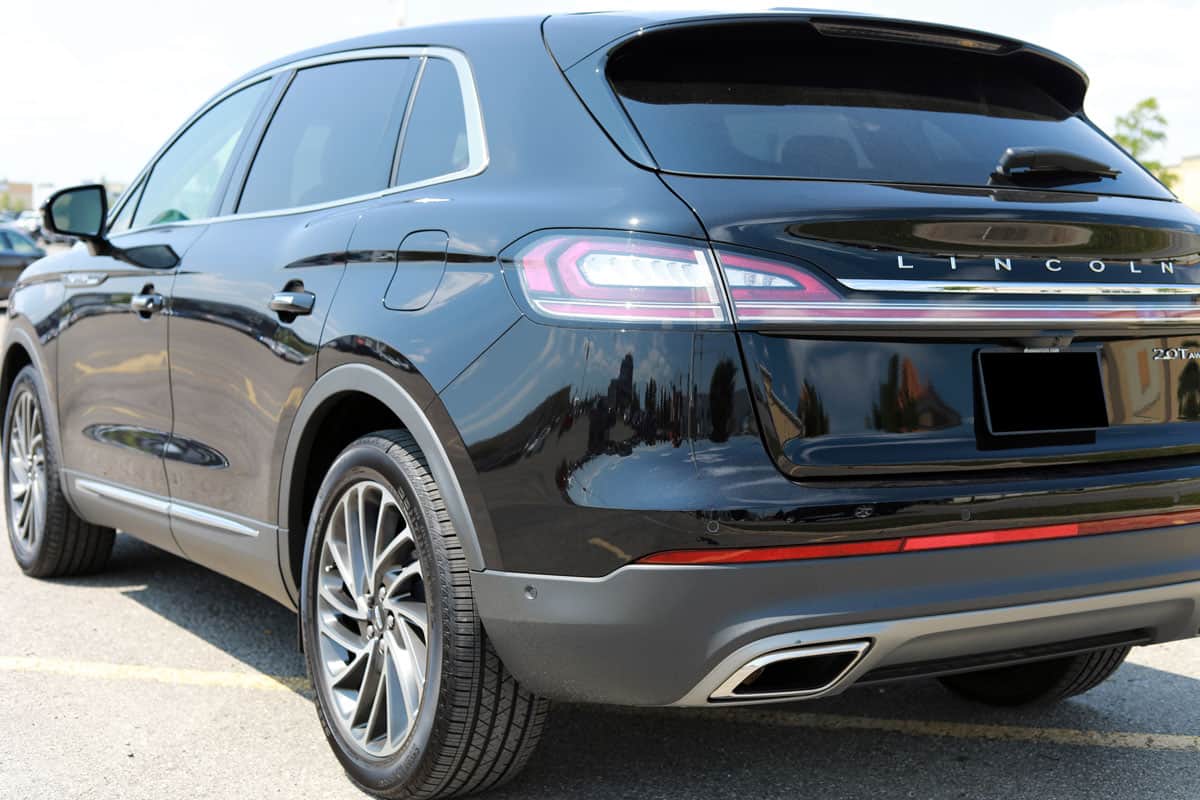 Rear and side view of a brand new shiny Lincoln Nautilus 2019 Reserve model