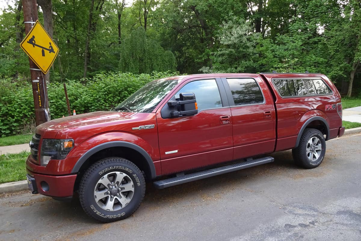 This Ford F150 FX4 Off Road truck. This is a large vehicle with 4 doors and an optional cover for the back. The Ford F150 series of trucks is very popular combining value and practicality