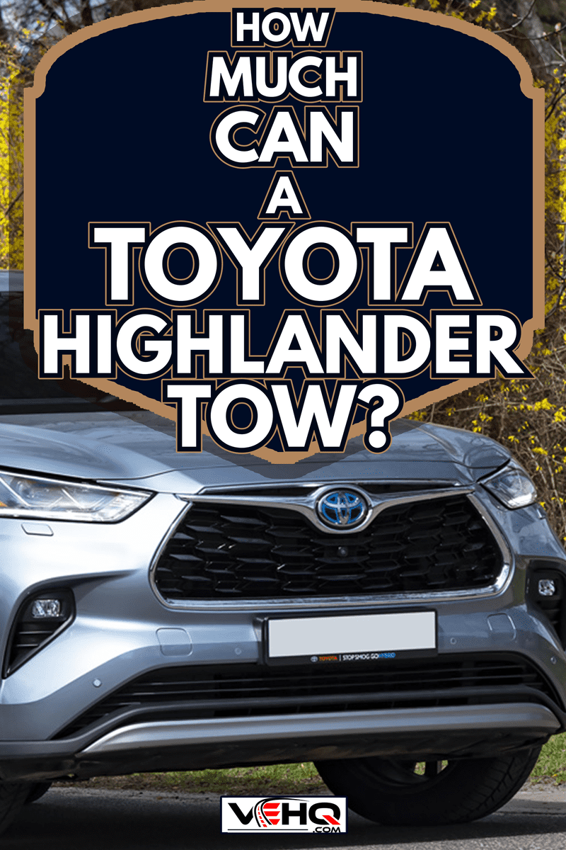 Toyota Highlander on a street in spring scenery. The Highlander is one of the most popular Toyota SUV vehicles in America - How Much Can A Toyota Highlander Tow
