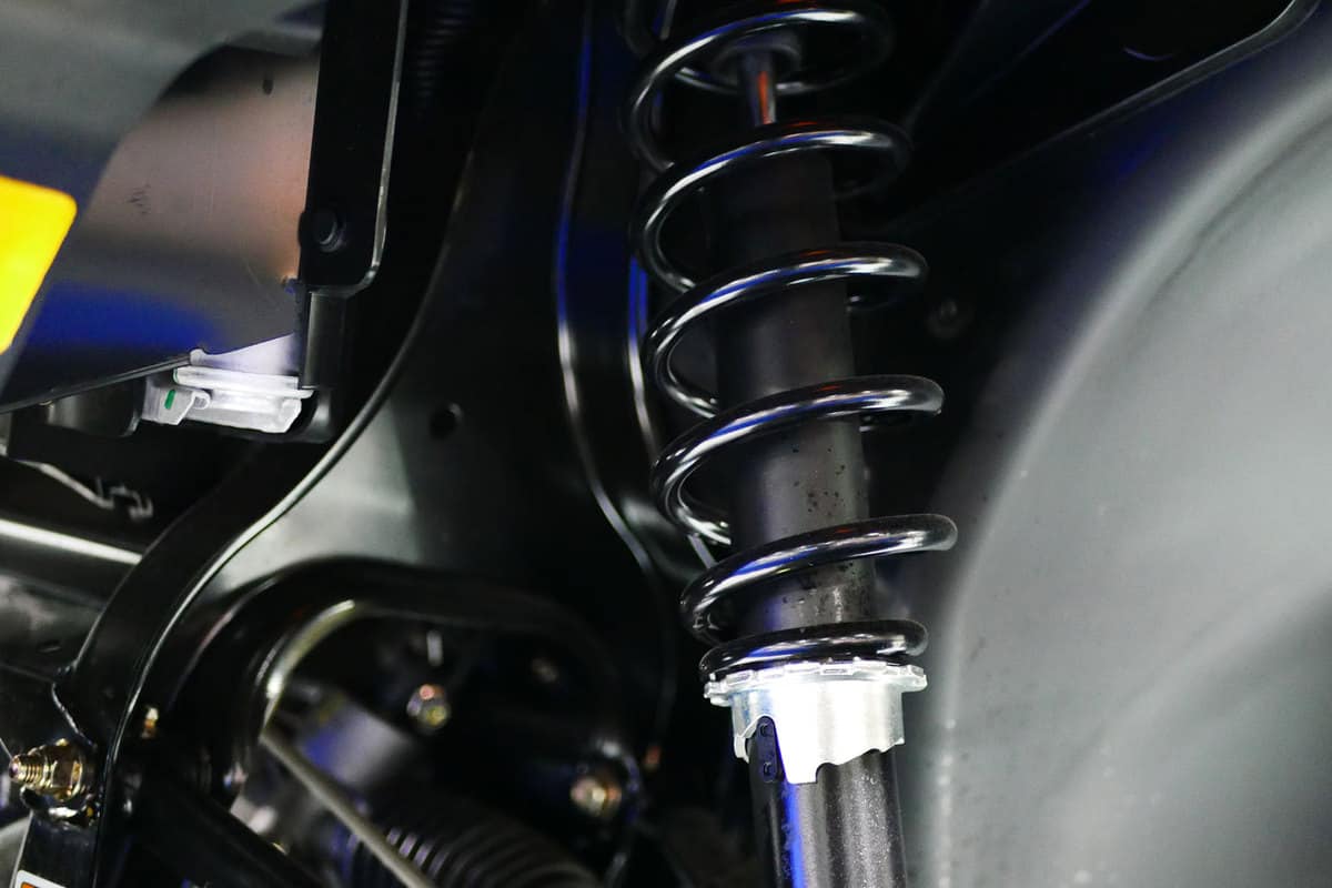 Up close photo of a car suspension