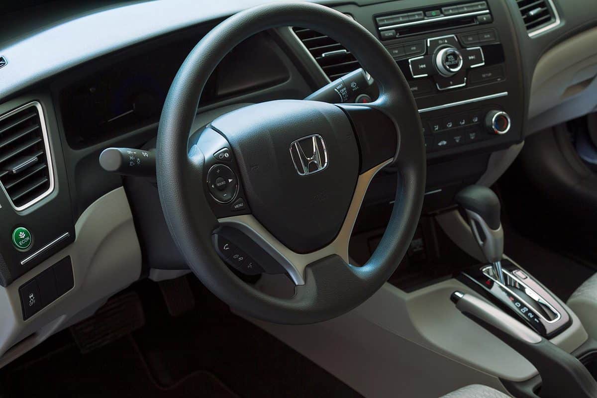 View of the steering wheel and dashboard of a Honda Civic