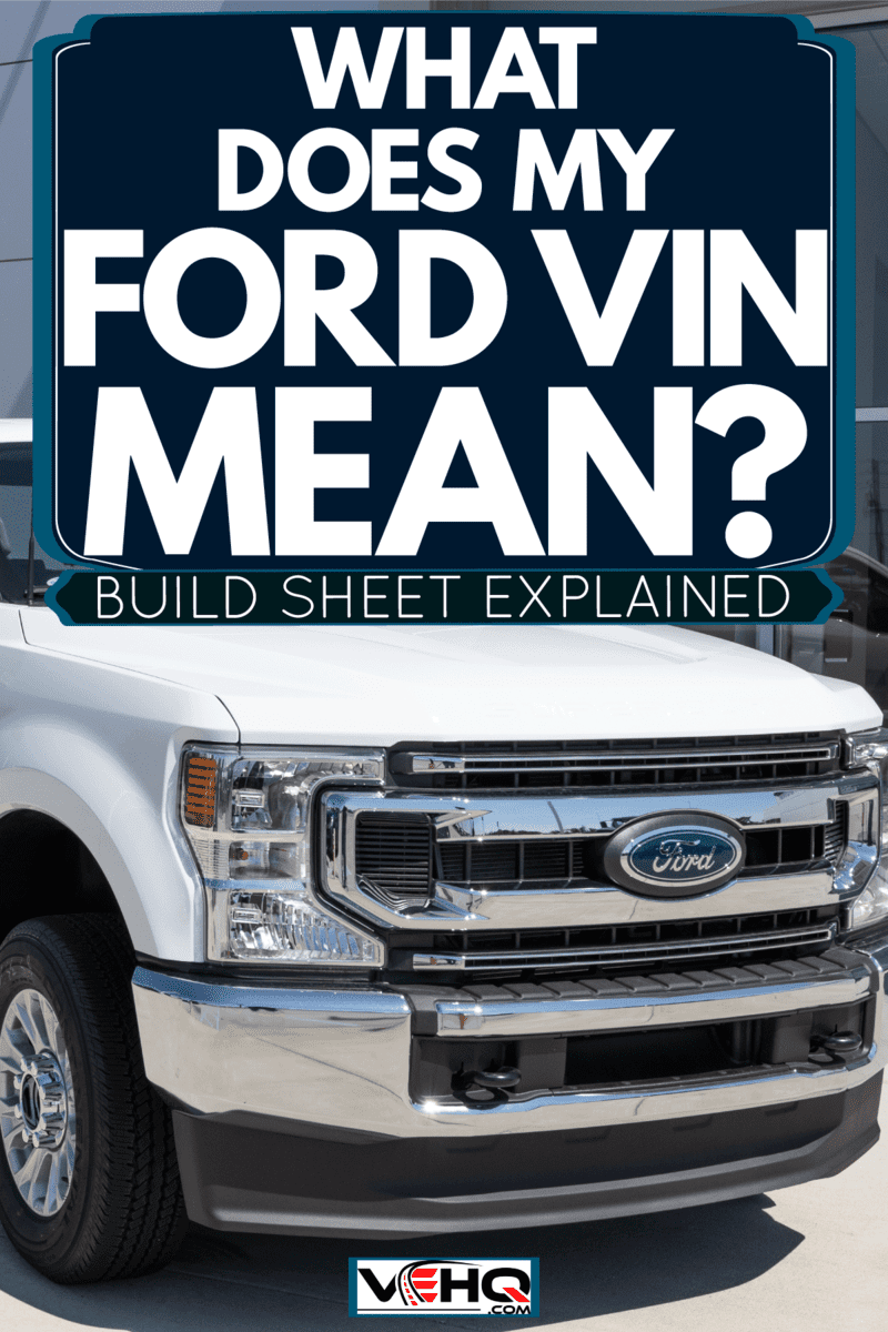 A white Ford F-250 parked outside a Ford dealership, What Does My Ford VIN Mean? Build Sheet Explained