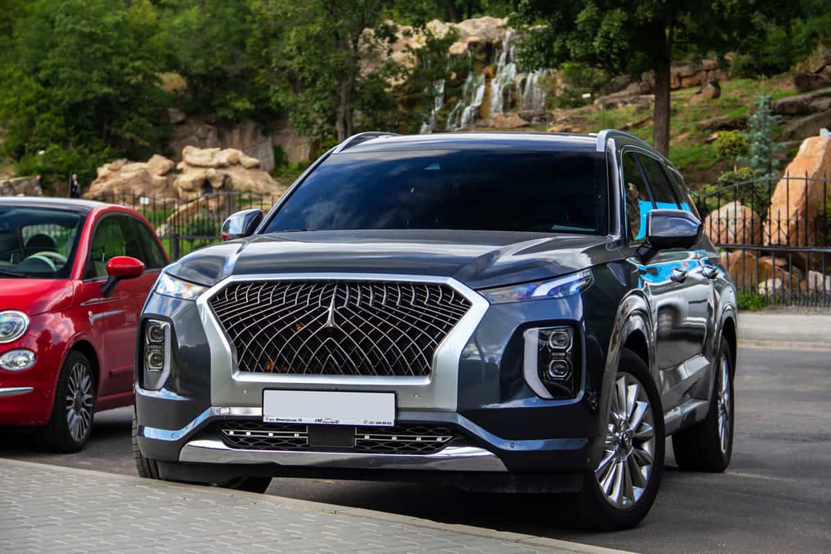 ew Hyundai Palisade SUV parked in the parking lot