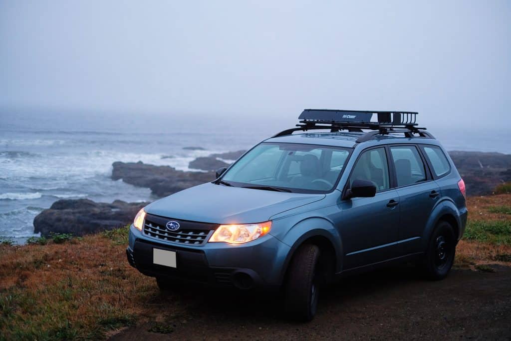 A 2012 Subaru Forester 2.5x on a rocky stretch of the Oregon coast.
