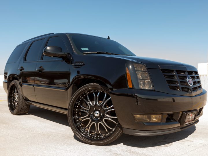A photo of a black parked Cadillac Escalade, the Escalade from Cadillac is their most popular SUV. - How Much Does A Lincoln Navigator Weigh?