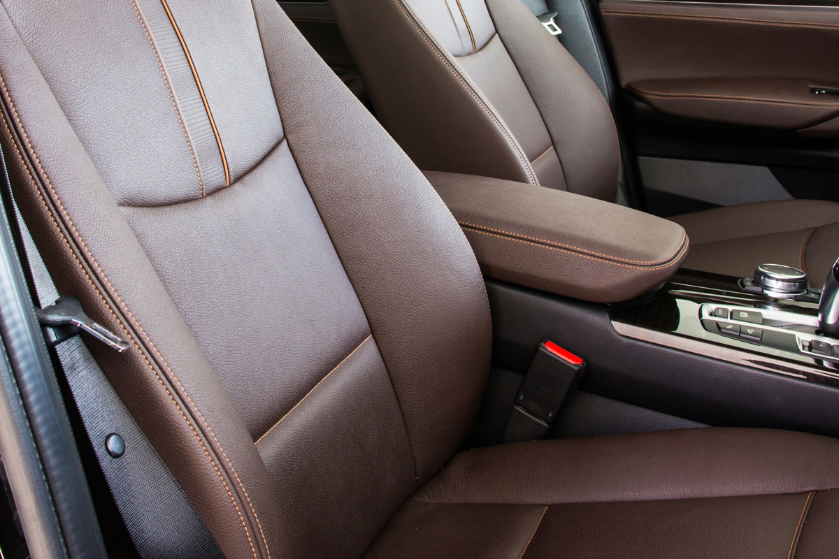 Brown leather seats with visible stitching