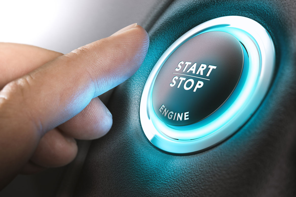Car stop start system with finger pressing the button