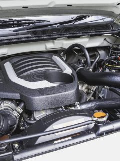 A diesel engine 1.9 lites turbo under the hood of a pickup truck, How To Clean A Pickup Truck's Engine
