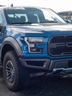 A Ford F-150 Raptor pickup truck at a Ford dealership, Ford F-150 Making A Whining Noise When Accelerating - What's Wrong?