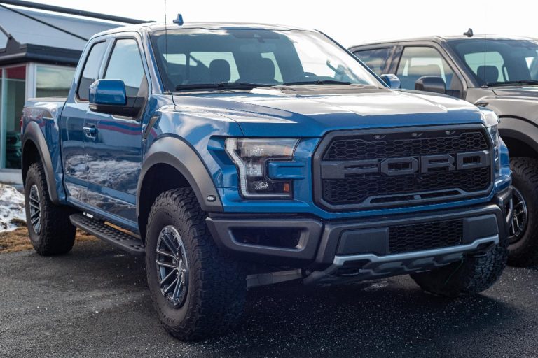 A Ford F-150 Raptor pickup truck at a Ford dealership, Ford F-150 Making A Whining Noise When Accelerating - What's Wrong?