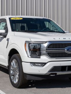 Ford F-150 display at a dealership, Why Is My Ford F150 Fan So Loud? [6 Common Symptoms]