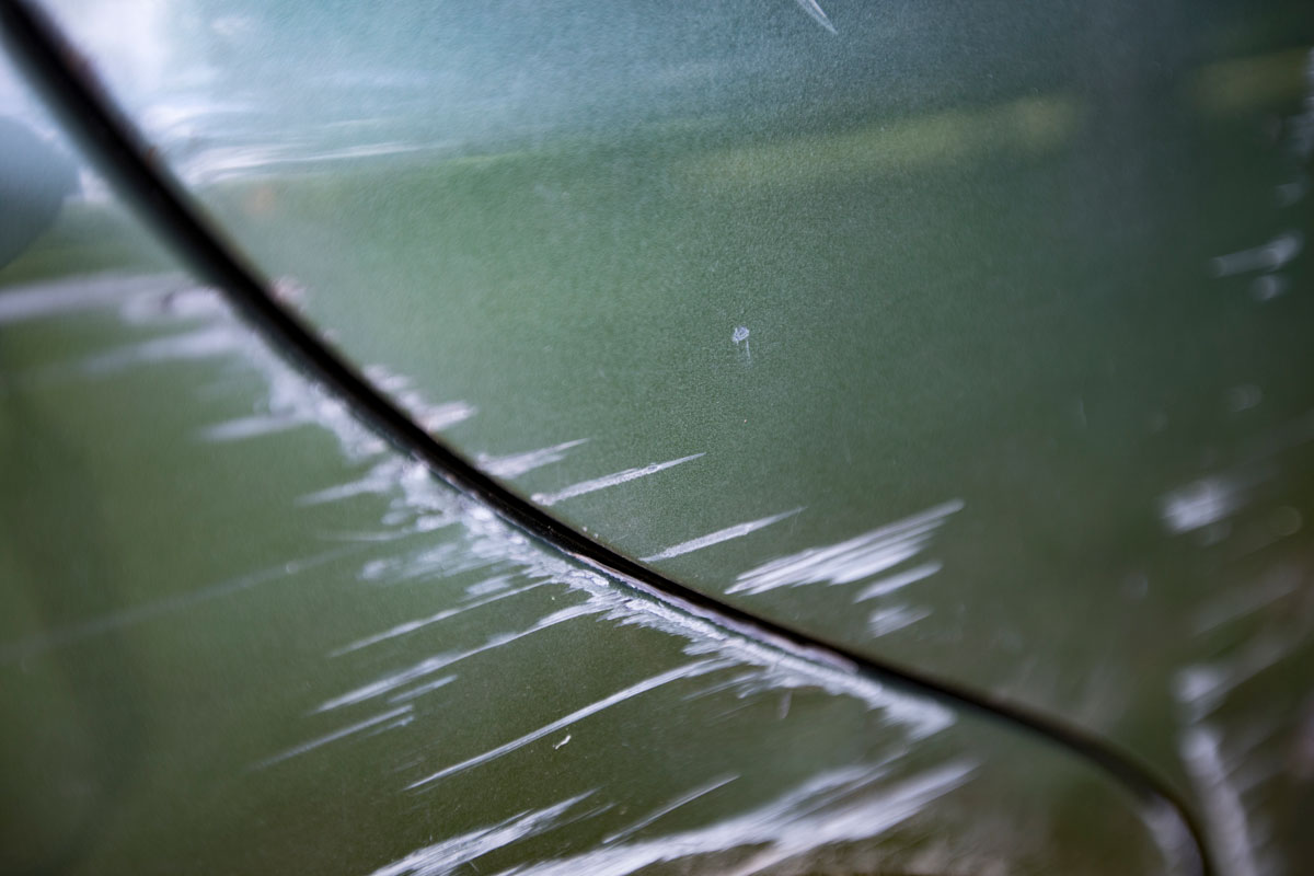 Heavy scratches on the side of a car