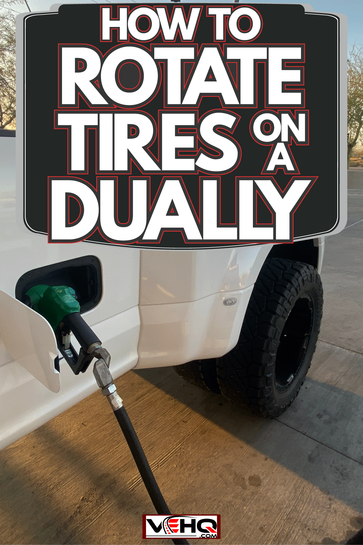 A long bed Dually Chevy truck gassing up, How To Rotate Tires On A Dually