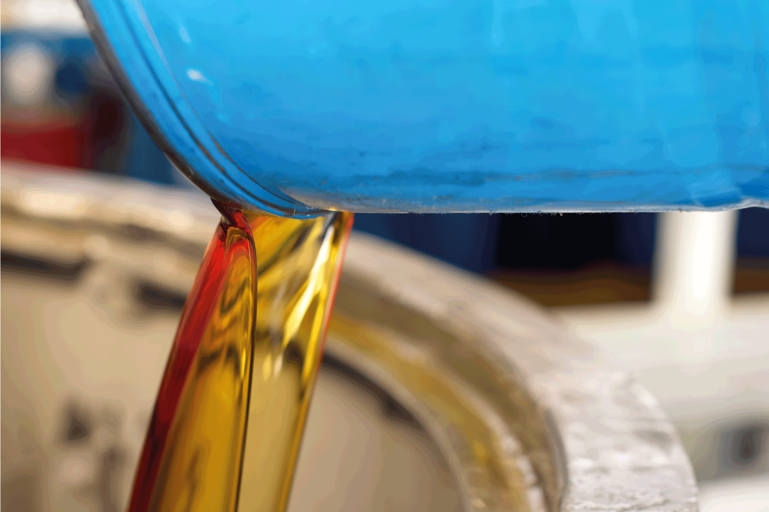 Lubricant oil poured from a barrel