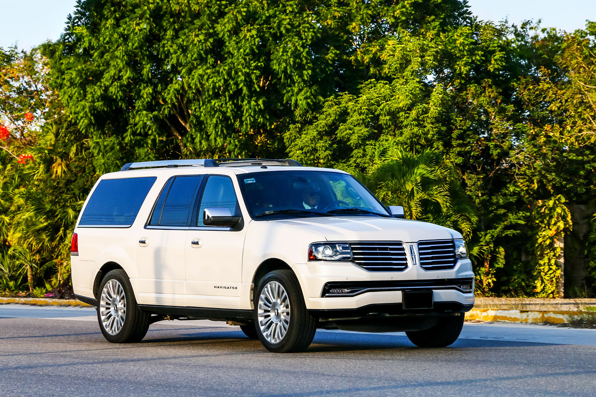 Motor car Lincoln Navigator at the interurban road., How To Start Lincoln Navigator [With And Without Key]