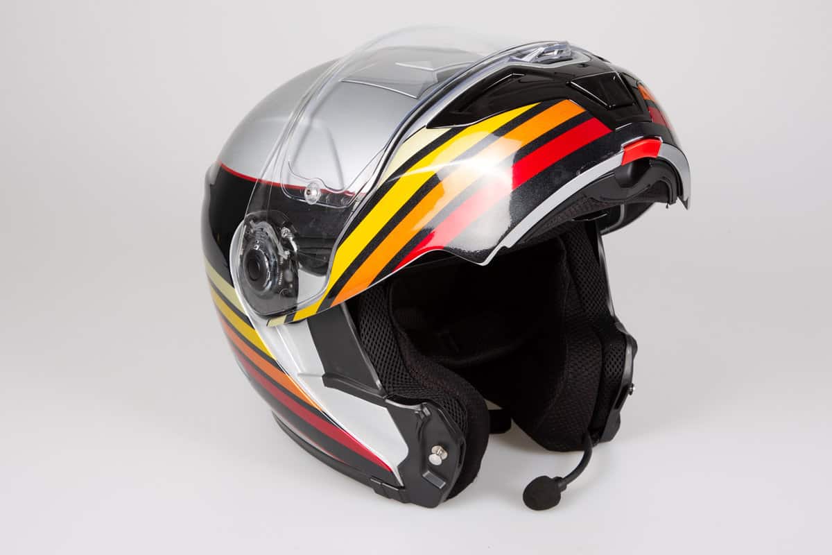 Motorcycle flip-front modular touring Helmet over white background
