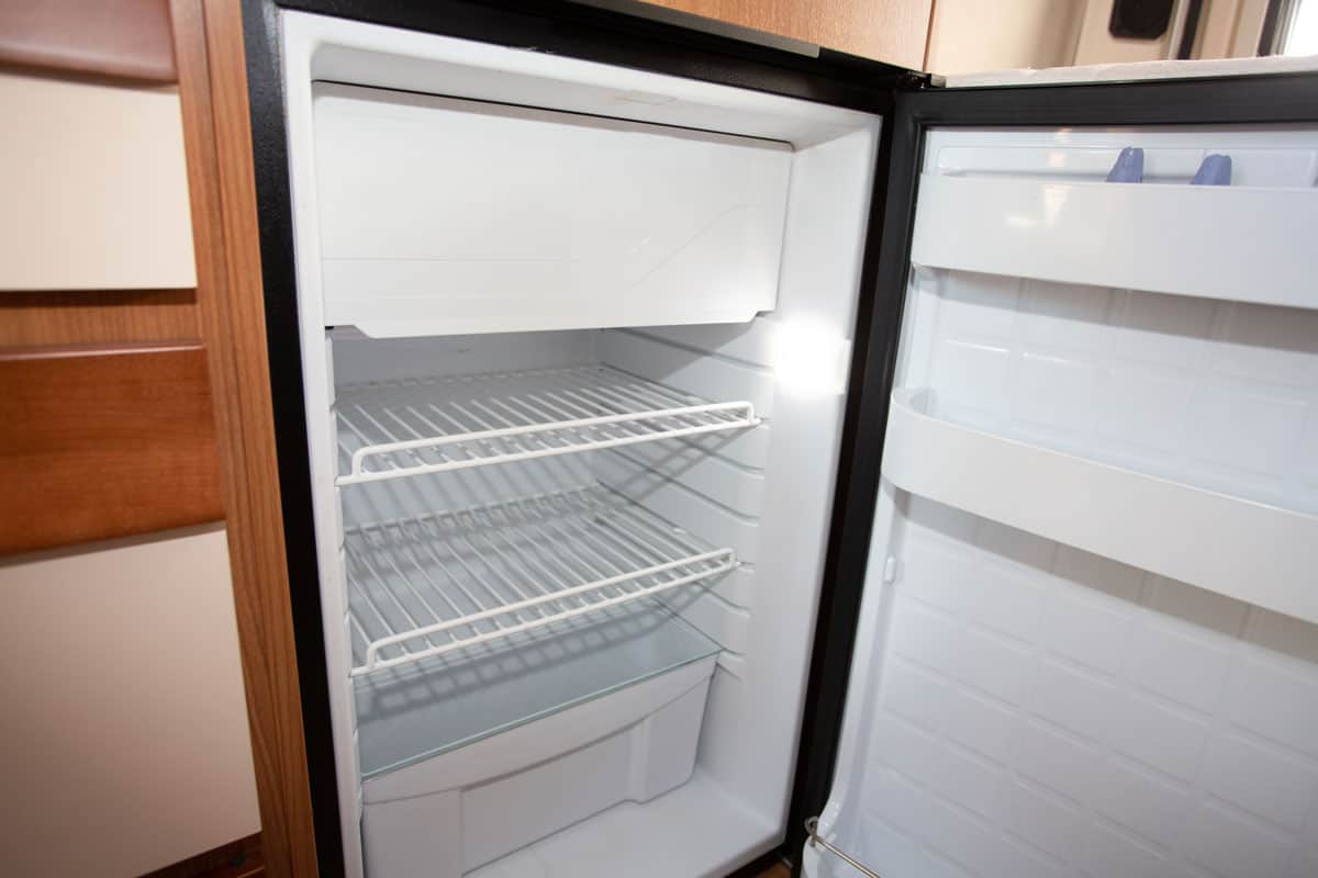 Opened empty RV fridge